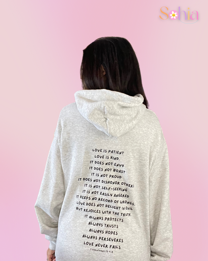 LOVE NEVER FAILS HOODIE